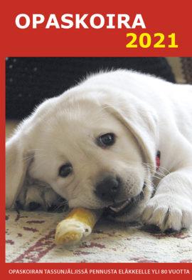 Kirjan kansi, jossa teksti Opaskoira 2021, ja kuva vaaleasta labradorinnoutajanpennusta.